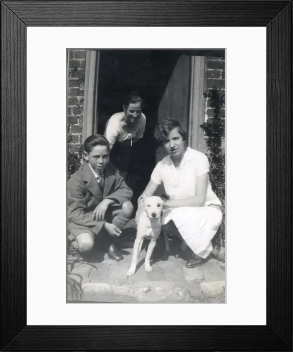Framed Print : Family of three with a dog in a doorway Framed Print : Family of three with a dog in a doorway