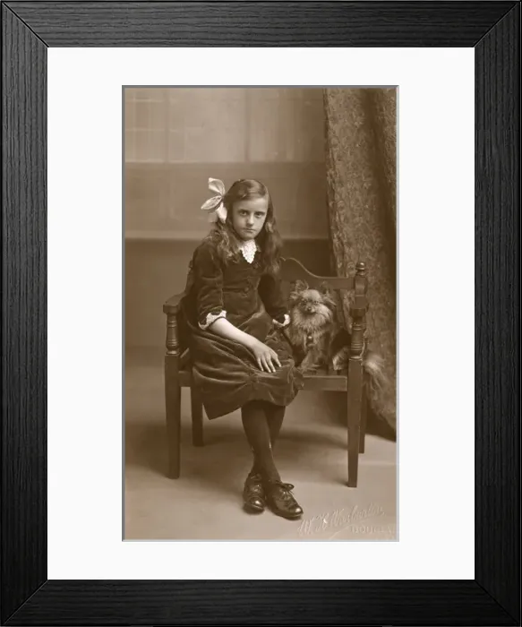 Framed Print : Studio portrait, girl with little dog Framed Print : Studio portrait, girl with little dog