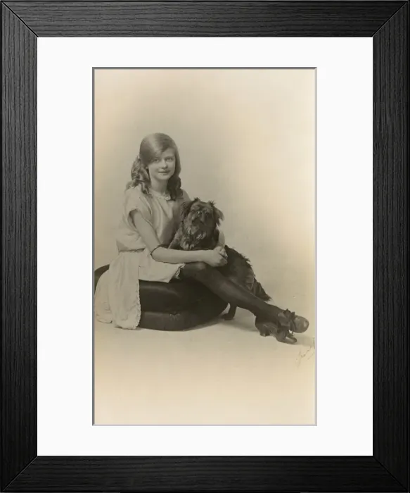 Framed Print : Studio portrait, girl with pug dog Framed Print : Studio portrait, girl with pug dog