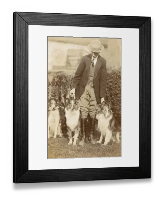 Framed Print : Man with three dogs in a garden Framed Print : Man with three dogs in a garden