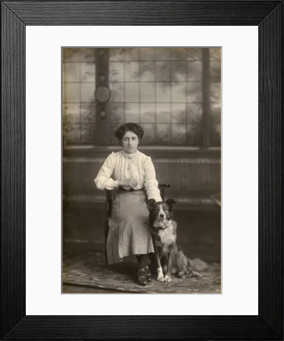 Framed Print : Studio portrait, young woman with dog Framed Print : Studio portrait, young woman with dog