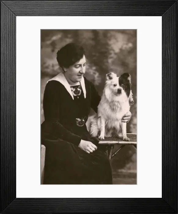 Framed Print : Studio portrait, woman with Pomeranian dog Framed Print : Studio portrait, woman with Pomeranian dog