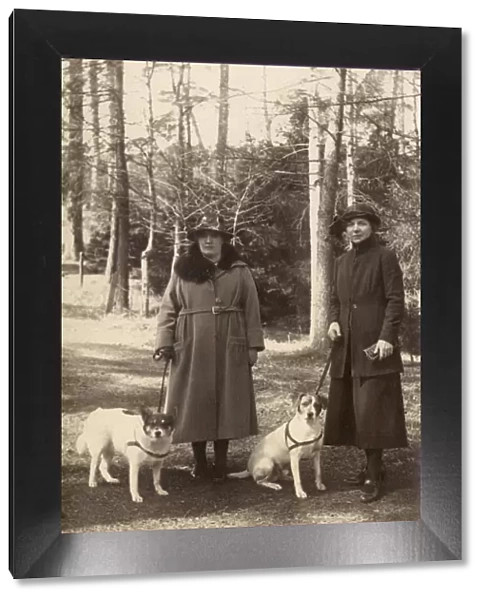 Two women out walking with dogs