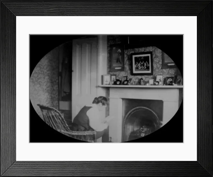 Framed Print : Student reading in study by a fire Framed Print : Student reading in study by a fire