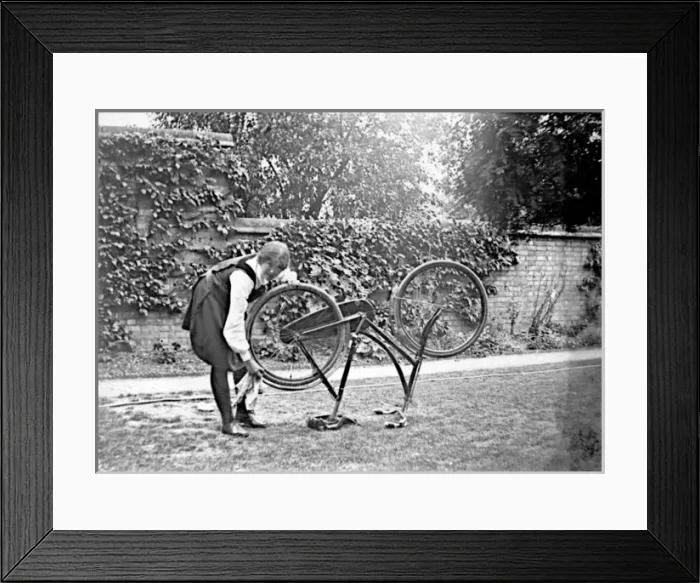 Framed Print : Student cleaning bicycle Framed Print : Student cleaning bicycle