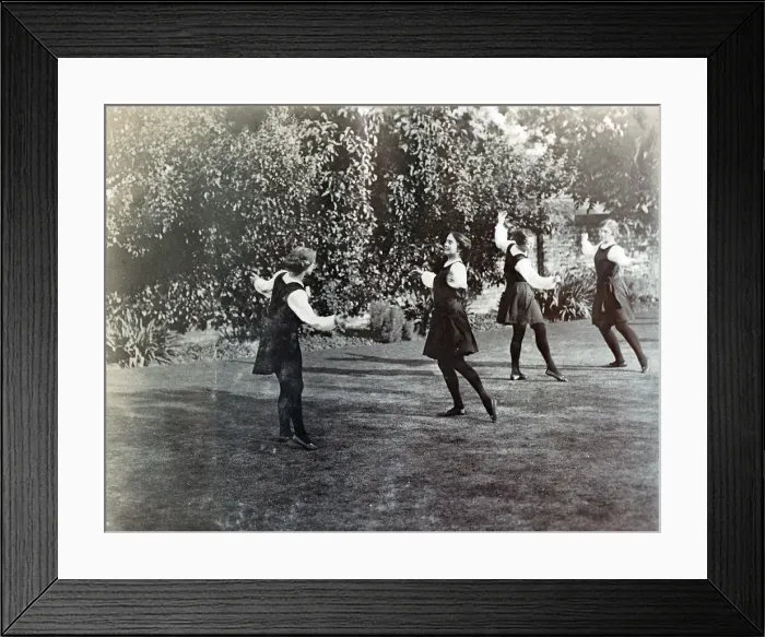 Framed Print : Four Seniors dancing in the garden Framed Print : Four Seniors dancing in the garden