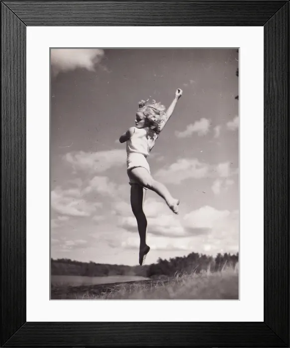 Framed Print : Female gymnast by lake jump Framed Print : Female gymnast by lake jump