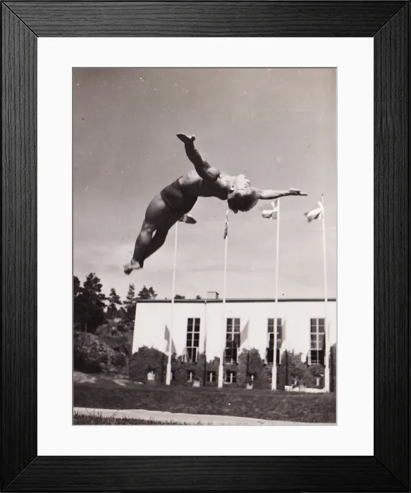 Framed Print : Male gymnast backward leap Framed Print : Male gymnast backward leap