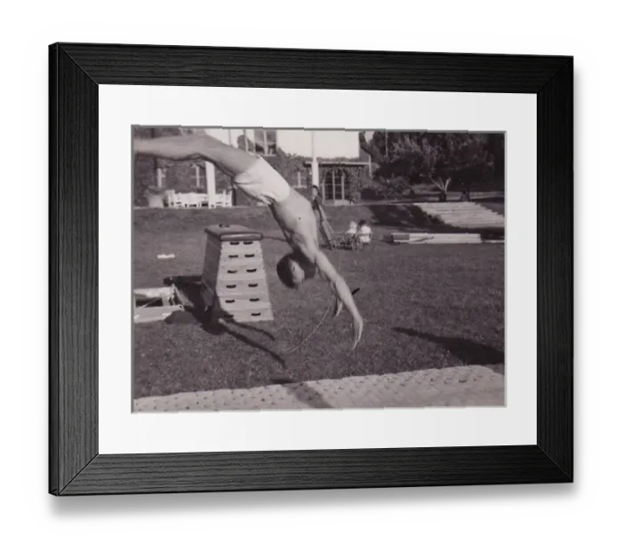 Framed Print : Male gymnast backward leap Framed Print : Male gymnast backward leap