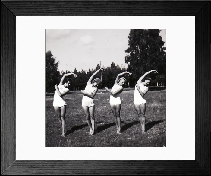 Framed Print : Four female gymnasts in row Framed Print : Four female gymnasts in row