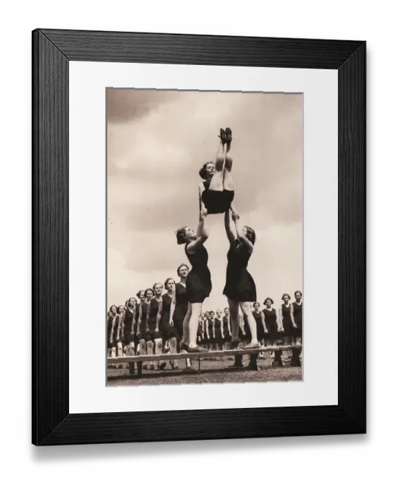 Framed Print : Queue waits to perform assisted jump Framed Print : Queue waits to perform assisted jump