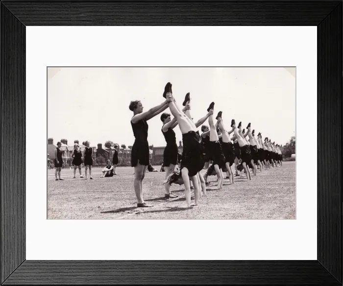 Framed Print : Bedford students demonstrate handstands Framed Print : Bedford students demonstrate handstands