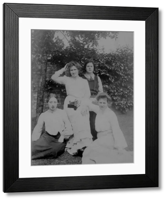 Framed Print : Students in ordinary clothes with camera Framed Print : Students in ordinary clothes with camera