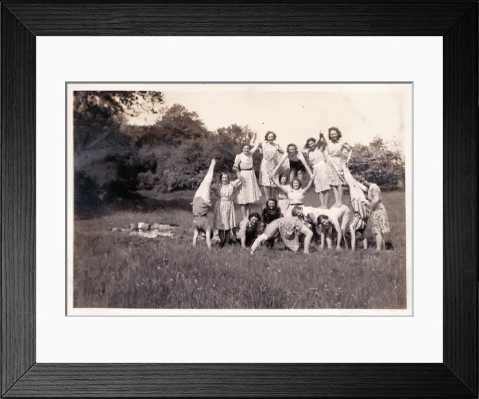 Framed Print : Summer Picnics human pyramid in meadow Framed Print : Summer Picnics human pyramid in meadow