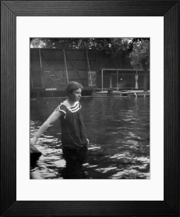 Framed Print : Woman standing in swimming pool Framed Print : Woman standing in swimming pool