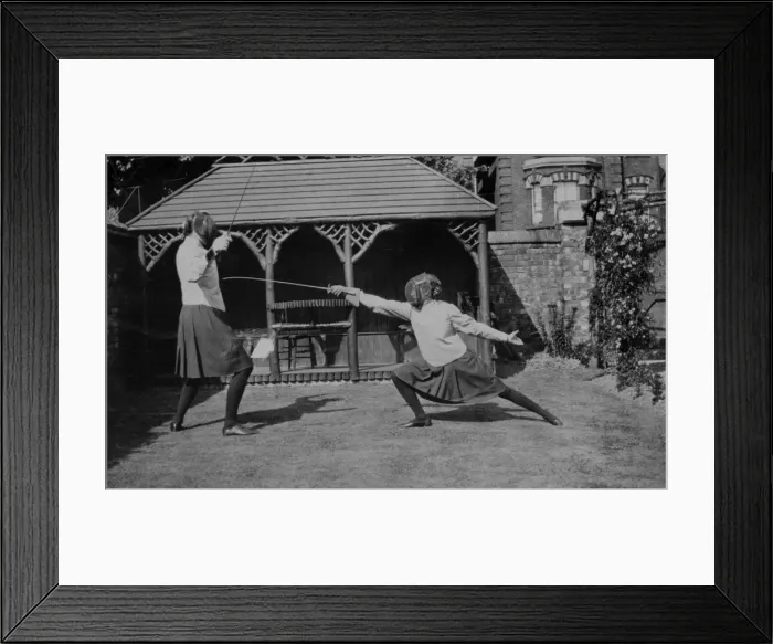 Framed Print : Fencer lunging Framed Print : Fencer lunging