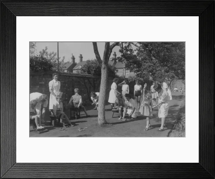 Framed Print : Working on patients in garden Framed Print : Working on patients in garden