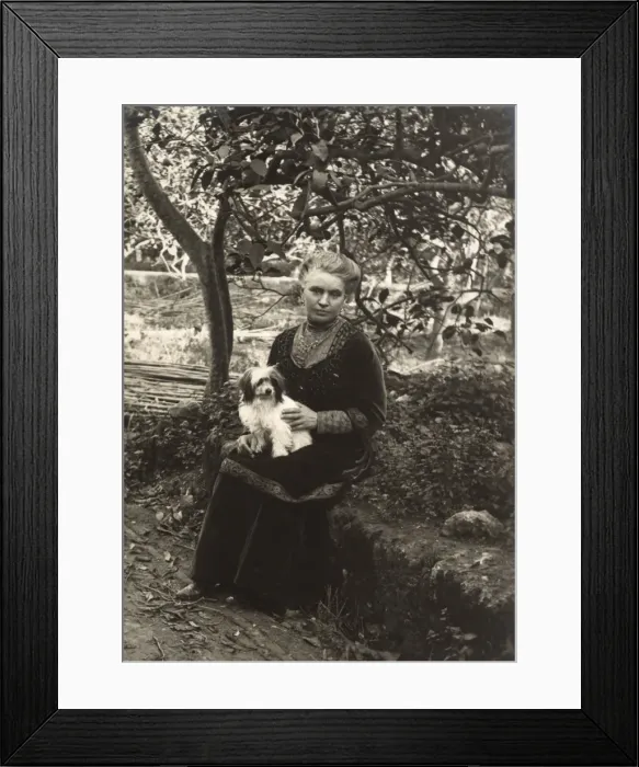 Framed Print : Woman with a dog in a garden, Italy Framed Print : Woman with a dog in a garden, Italy