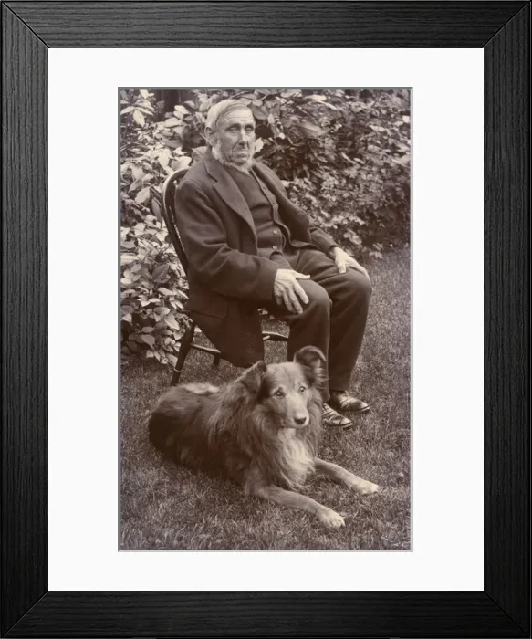 Framed Print : Man with a dog in a garden Framed Print : Man with a dog in a garden