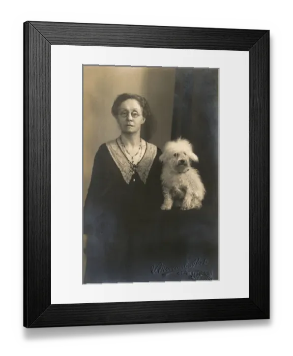 Framed Print : Studio portrait, woman with little white dog Framed Print : Studio portrait, woman with little white dog