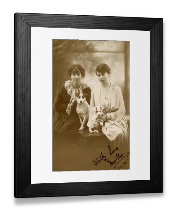 Framed Print : Studio portrait, two young women with dog and puppy Framed Print : Studio portrait, two young women with dog and puppy