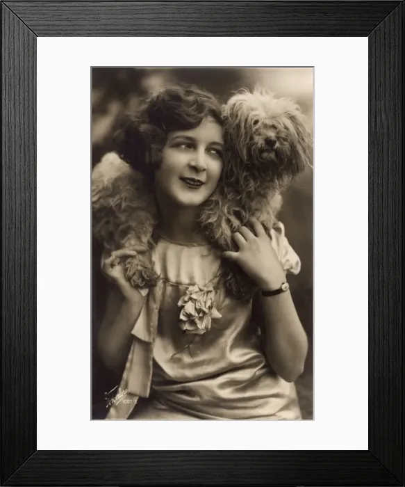 Framed Print : Studio portrait, young woman with terrier dog Framed Print : Studio portrait, young woman with terrier dog