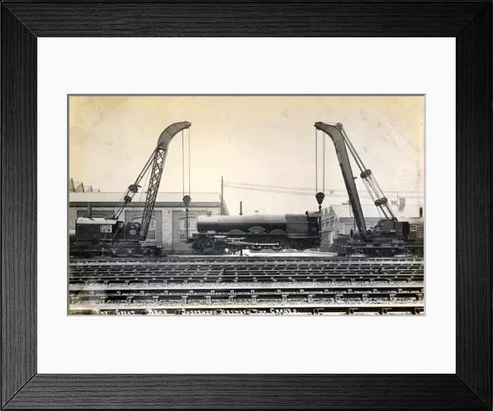 Framed Print : Locomotive Suspended Between Two Cranes, Crewe, Cheshire Framed Print : Locomotive Suspended Between Two Cranes, Crewe, Cheshire