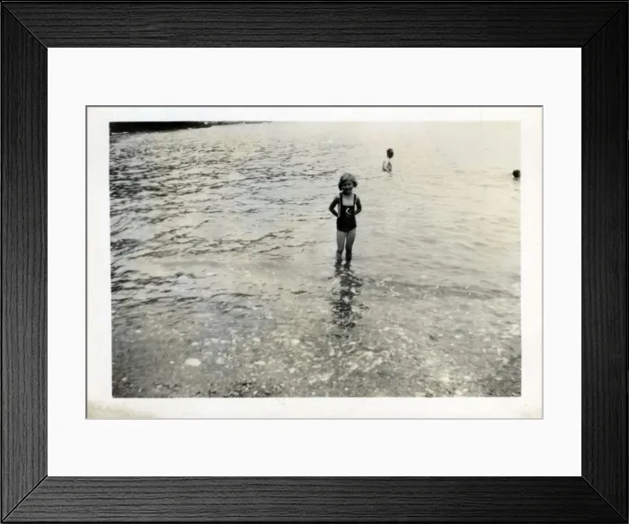 Framed Print : Child on the Beach, Combe Martin, Devon Framed Print : Child on the Beach, Combe Martin, Devon