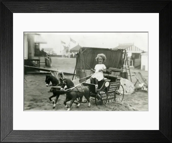 Framed Print : Primative Fairground / Beach Amusements - Girl on buggy Framed Print : Primative Fairground / Beach Amusements - Girl on buggy