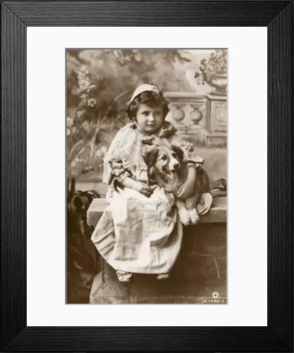 Framed Print : Studio portrait, little girl with her dog Framed Print : Studio portrait, little girl with her dog
