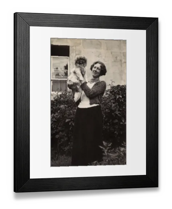 Framed Print : Woman with Pekingese dog in a garden Framed Print : Woman with Pekingese dog in a garden