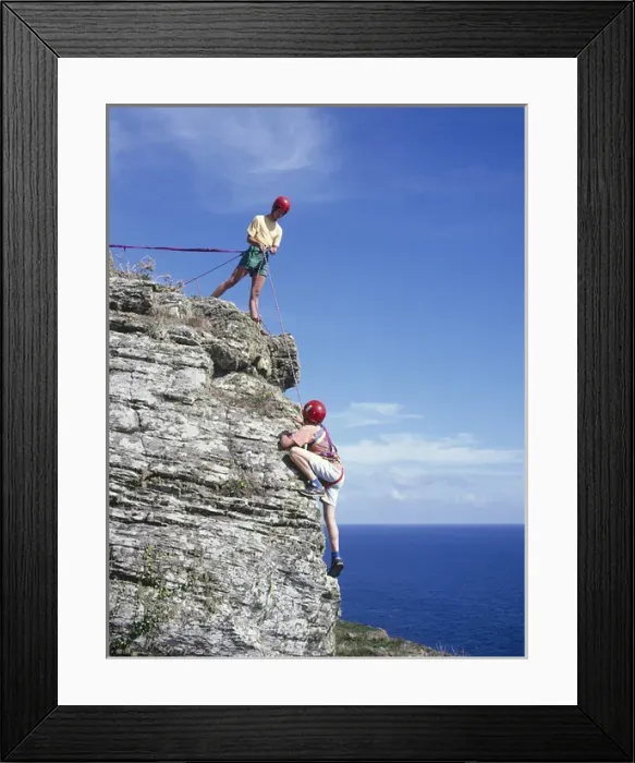 Framed Print : Rock climbing near Porthcurno, Cornwall Framed Print : Rock climbing near Porthcurno, Cornwall