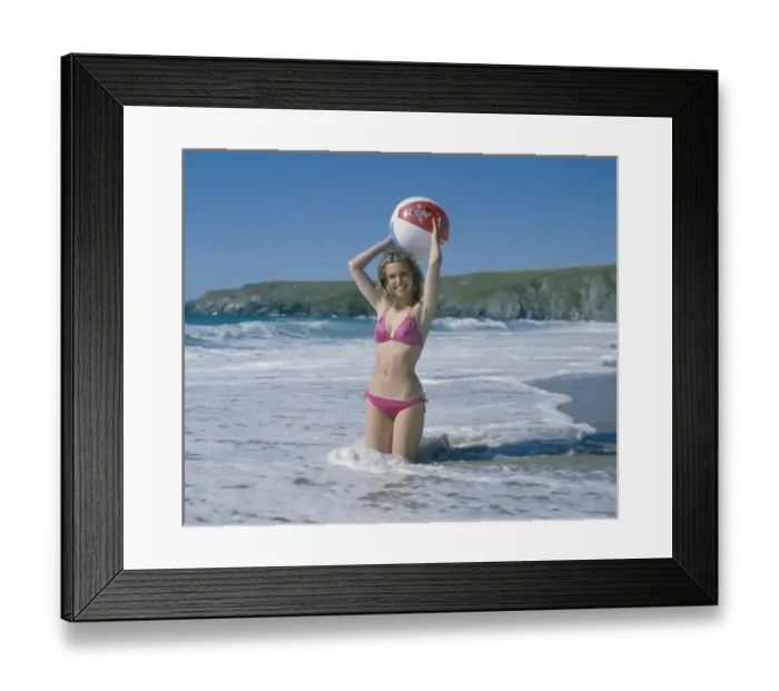 Framed Print : Young woman in pink bikini, West Country Framed Print : Young woman in pink bikini, West Country