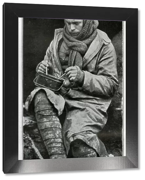 British soldier eating rations at the Front, WW1