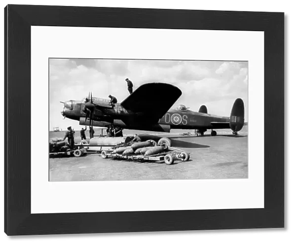 Avro 683 Lancaster I of No 467 Squadron bombing-up-beca