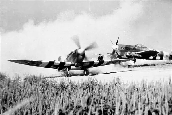 Hawker Typhoon Ib with Spitfire IXb passing in Normandy