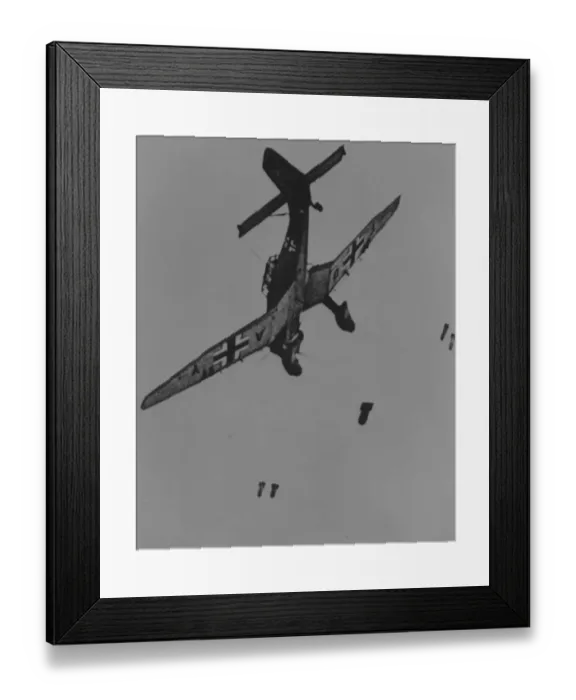 Framed Print : Junkers Ju 87B -releases its bombs from low level with Framed Print : Junkers Ju 87B -releases its bombs from low level with