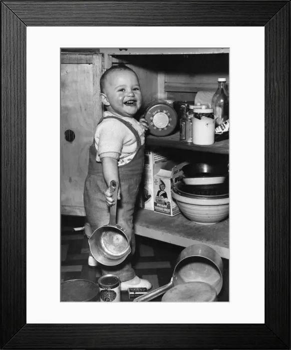 Framed Print : Toddler helping out in the kitchen Framed Print : Toddler helping out in the kitchen