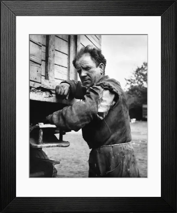 Framed Print : Fairground worker closing lorry before departure Framed Print : Fairground worker closing lorry before departure