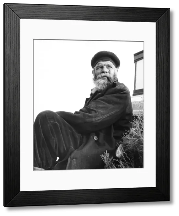 Framed Print : Tramp sitting on grass, Balham, SW London Framed Print : Tramp sitting on grass, Balham, SW London