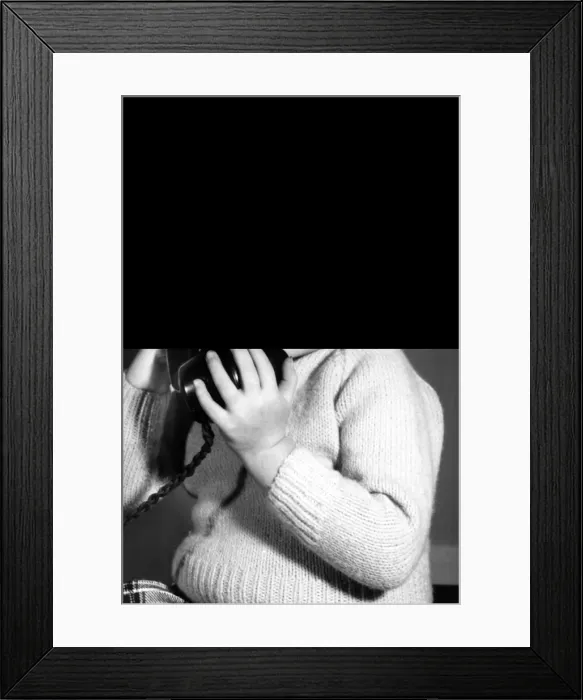 Framed Print : Studio portrait, little boy on the phone Framed Print : Studio portrait, little boy on the phone
