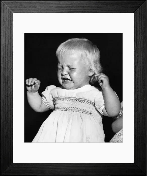 Framed Print : Studio portrait, little child crying Framed Print : Studio portrait, little child crying