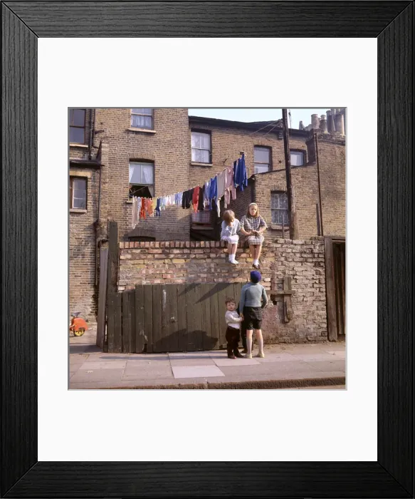 Framed Print : Chldren on a wall, with washing, Balham, SW London Framed Print : Chldren on a wall, with washing, Balham, SW London
