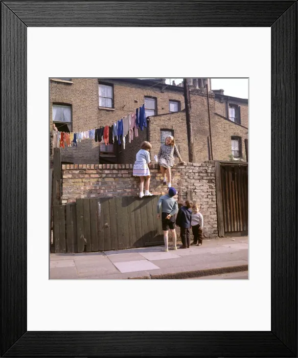 Framed Print : Chldren on a wall, with washing, Balham, SW London Framed Print : Chldren on a wall, with washing, Balham, SW London