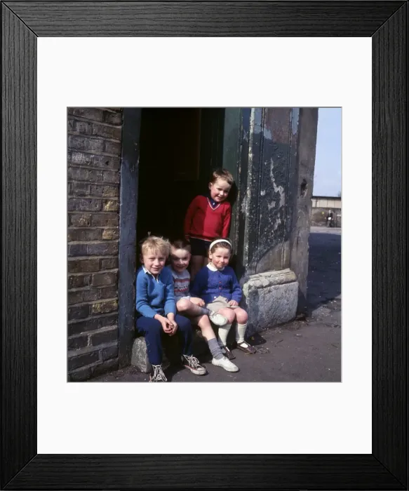 Framed Print : Children on doorstep in a Balham street, SW London Framed Print : Children on doorstep in a Balham street, SW London