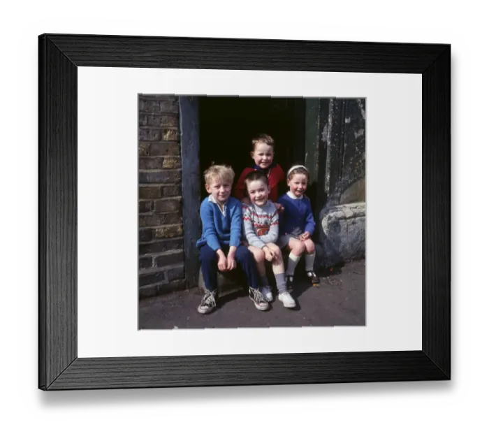 Framed Print : Children on doorstep in a Balham street, SW London Framed Print : Children on doorstep in a Balham street, SW London