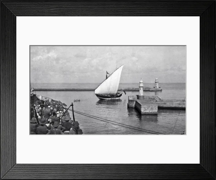 Framed Print : Sailing boat entering a harbour Framed Print : Sailing boat entering a harbour