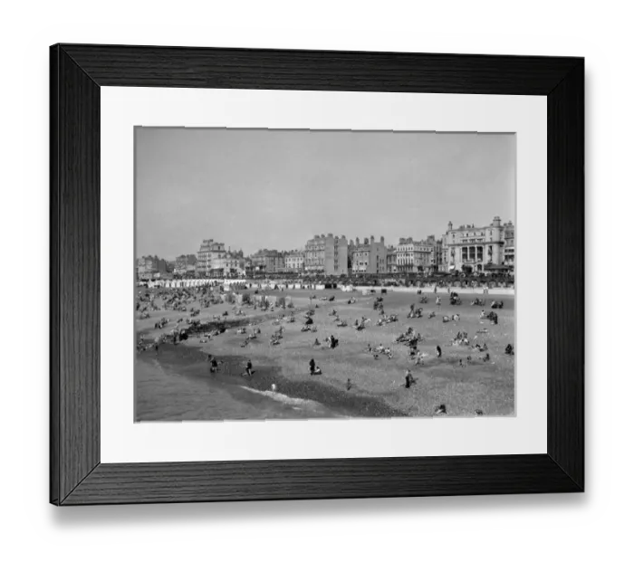 Framed Print : Seaside resort with hotels, beach huts and holidaymakers Framed Print : Seaside resort with hotels, beach huts and holidaymakers