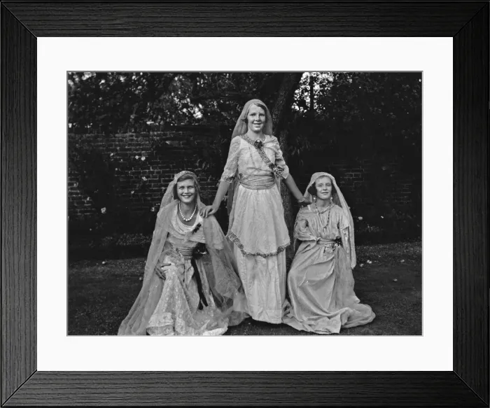 Framed Print : Three women wearing fancy dress in a garden Framed Print : Three women wearing fancy dress in a garden