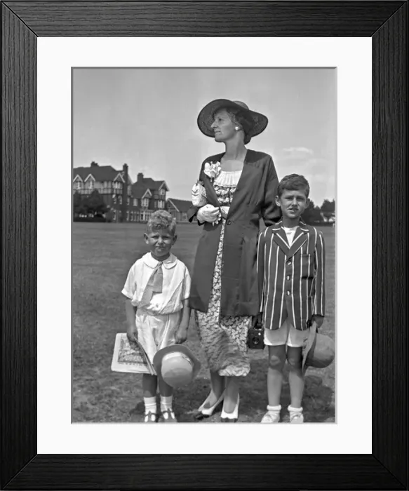 Framed Print : Woman and two boys in their best clothes Framed Print : Woman and two boys in their best clothes